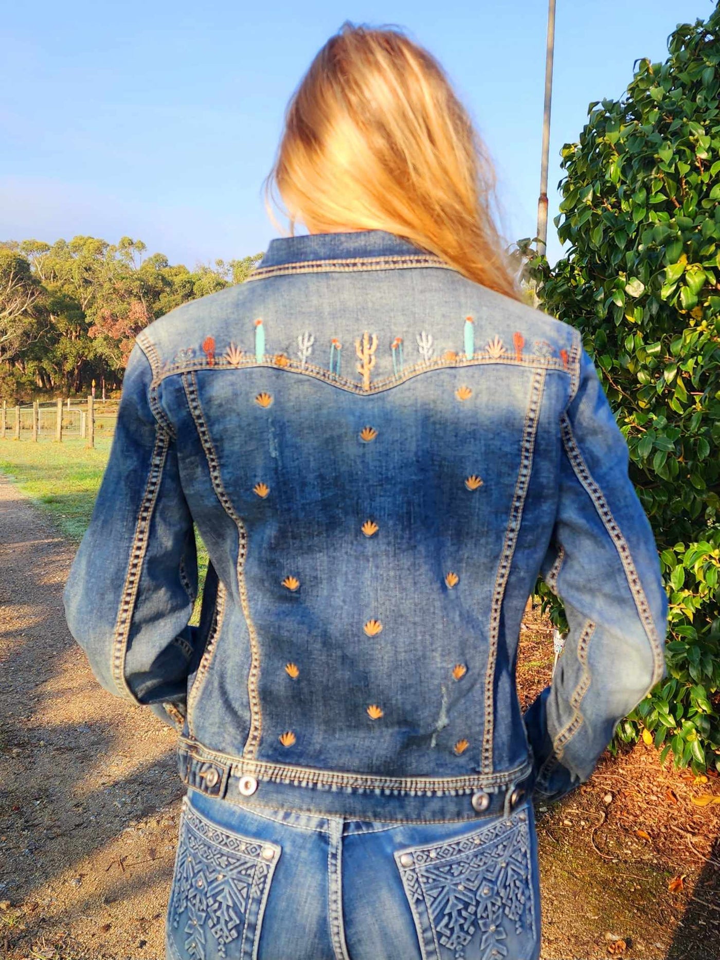 Grace in  La Denim Cowgirl Jacket Cactus Embroidery