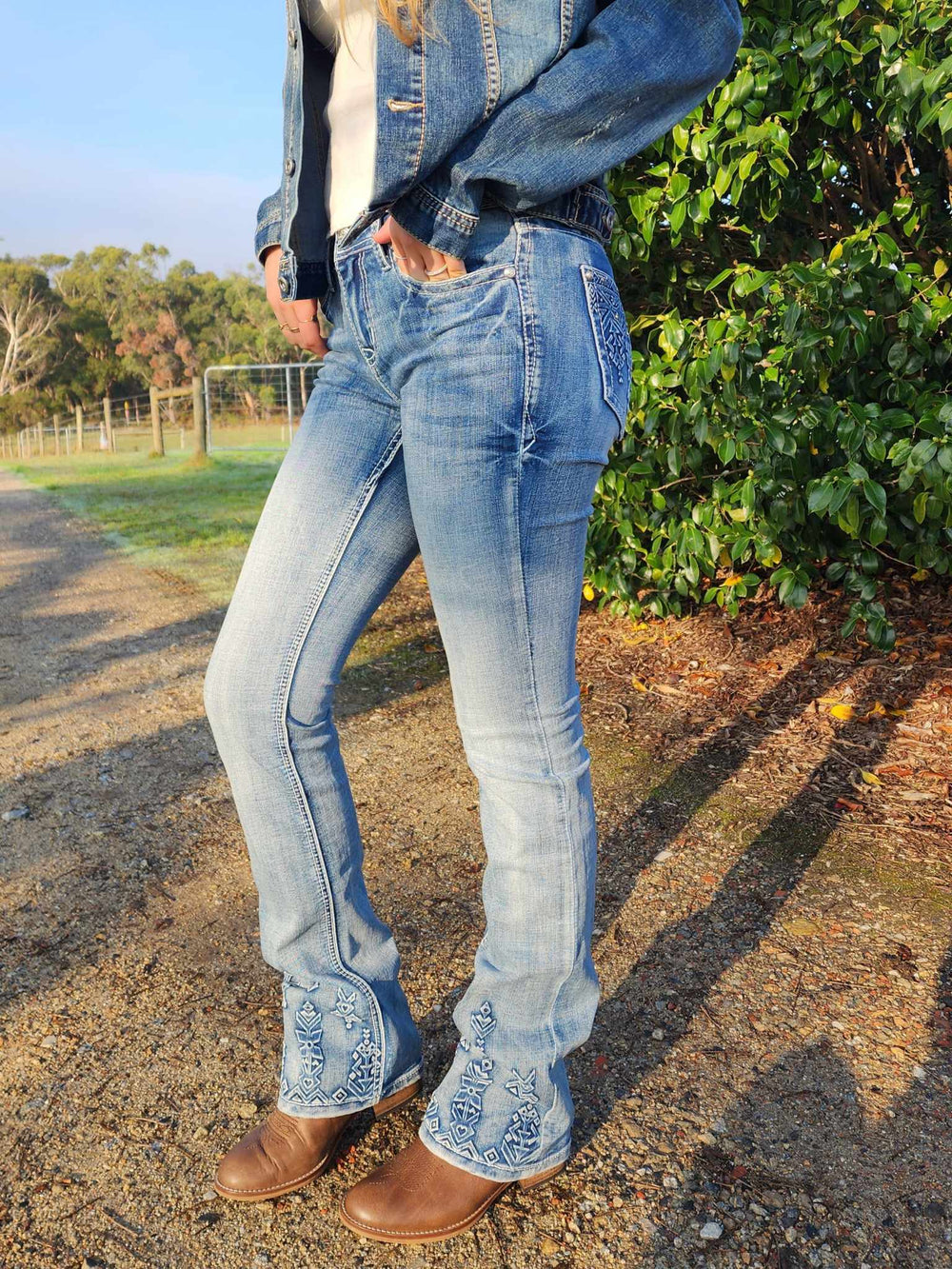 Grace in LA Mid Rise Western Tribal Pocket & Leg Jeans