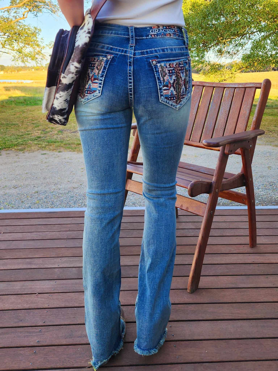 Grace in LA Mid Rise Western Aztec Cactus Jeans