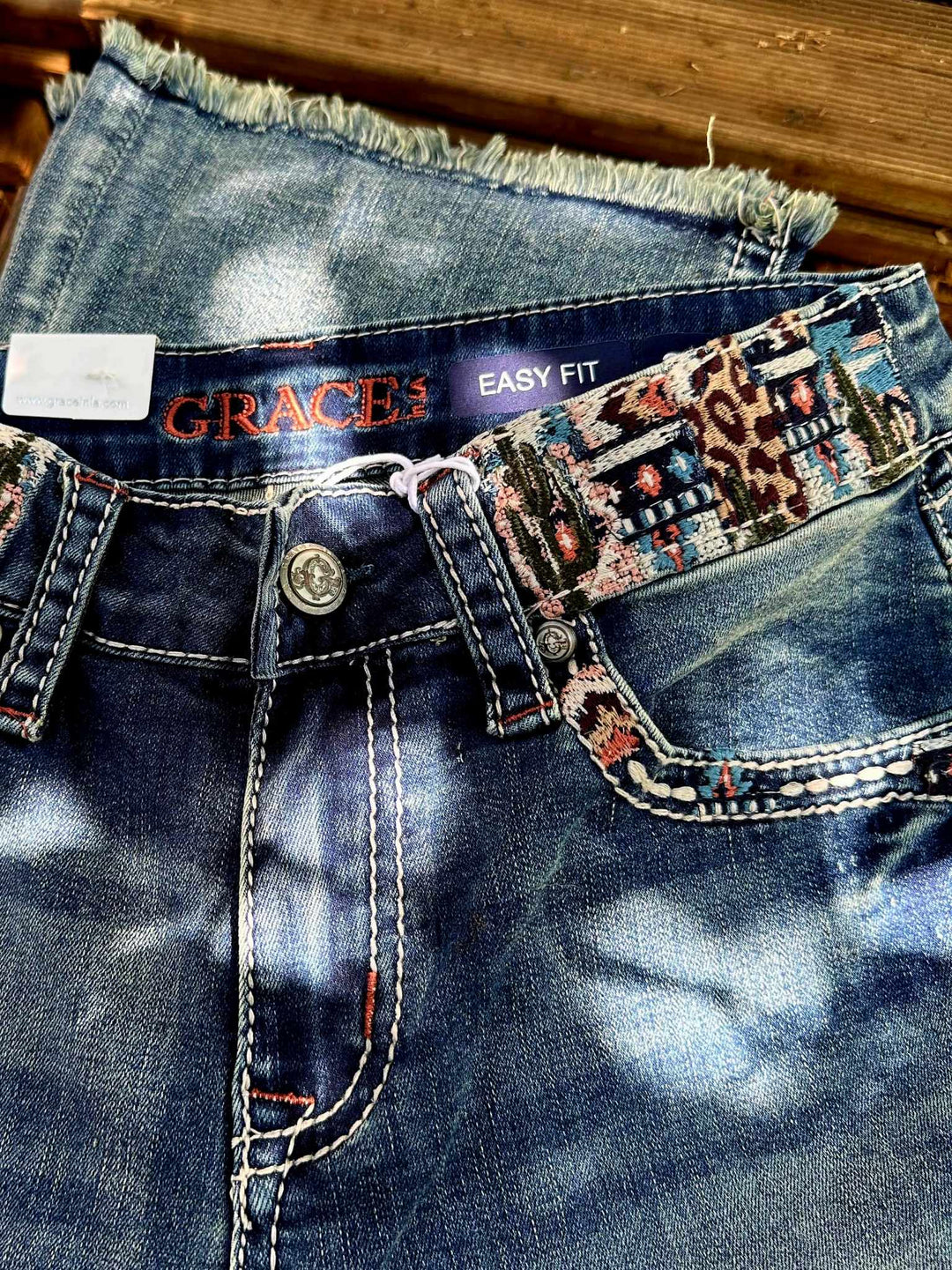 Grace in LA Mid Rise Western Aztec Cactus Jeans