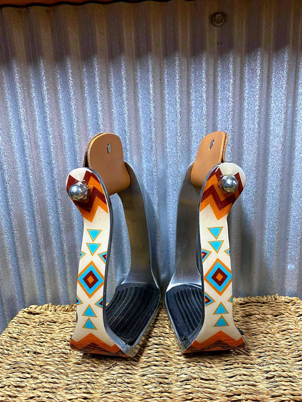 Stirrups - ®   White and Light Blue Navajo print stirrup.