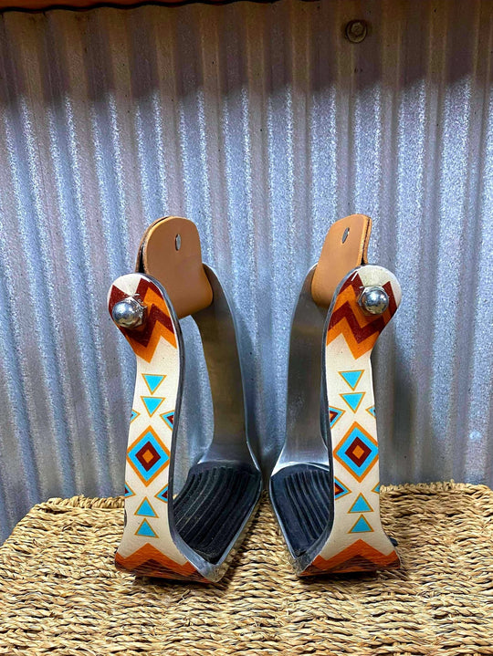 Stirrups - ®   White and Light Blue Navajo print stirrup.