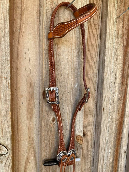 Western Bridle One Ear Tan leather headstall with basket weave tooling.