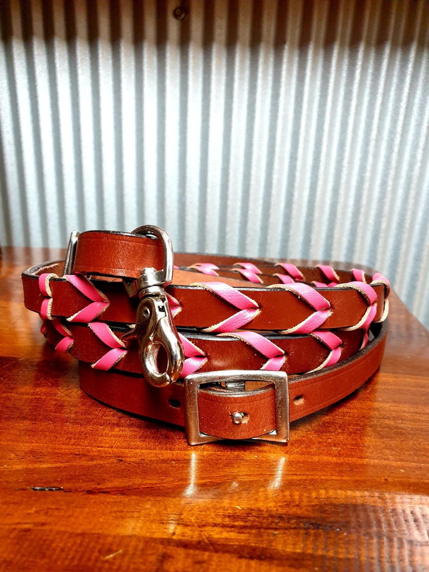 Reins - ® 8ft leather braided rein with Pink colored lacing
