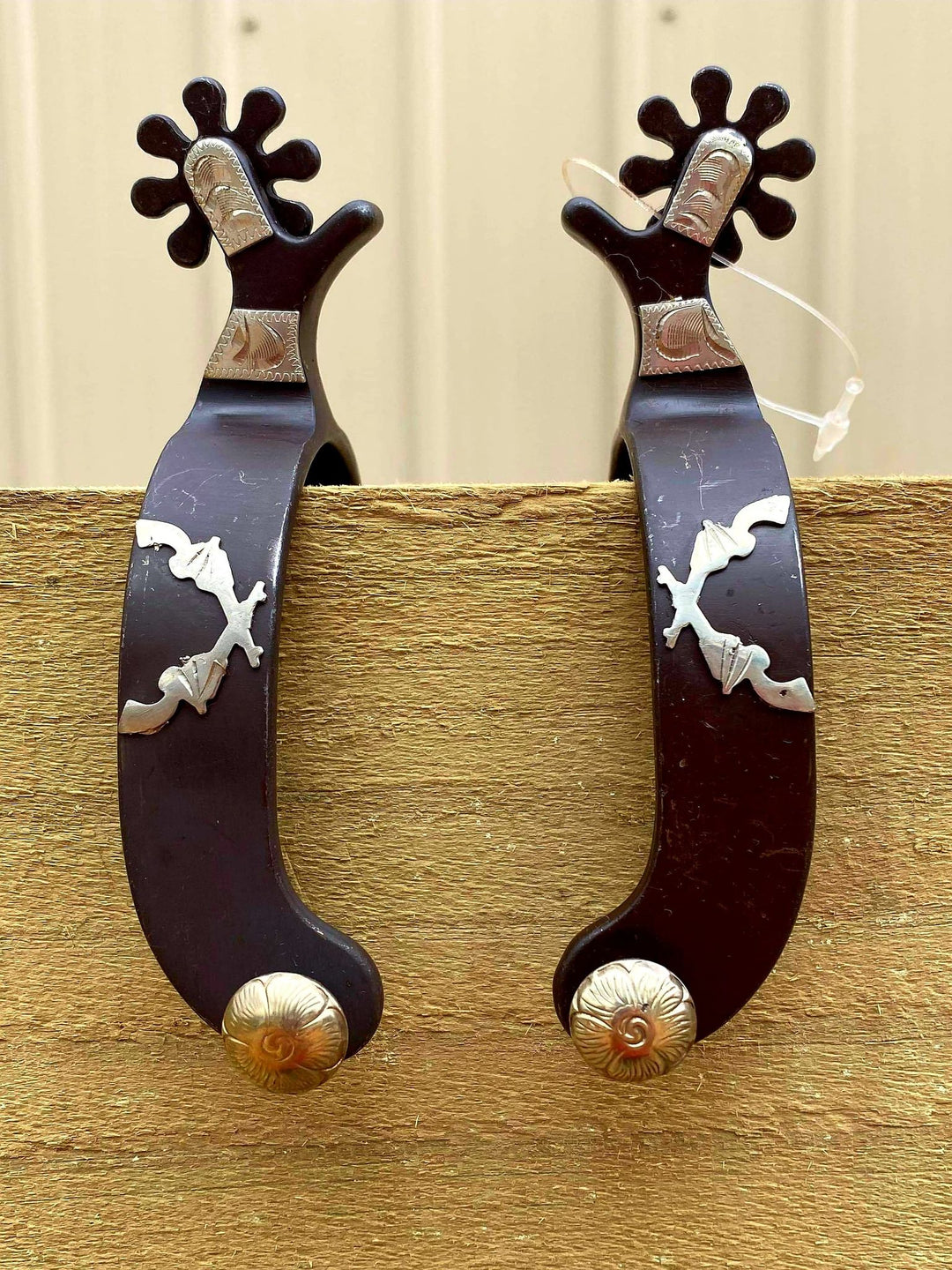 Spur -  Ladies Antique brown spur with engraved silver guns overlay